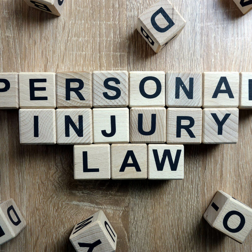 The Pros and Cons of Being a Personal Injury Lawyer 2 Personal Injury Law spelled out in block letters