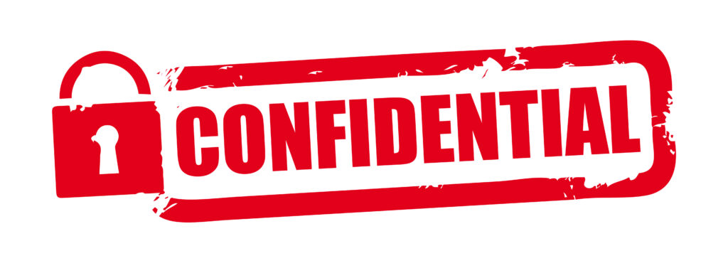 Confidential red grunge rubber stamp on white background.