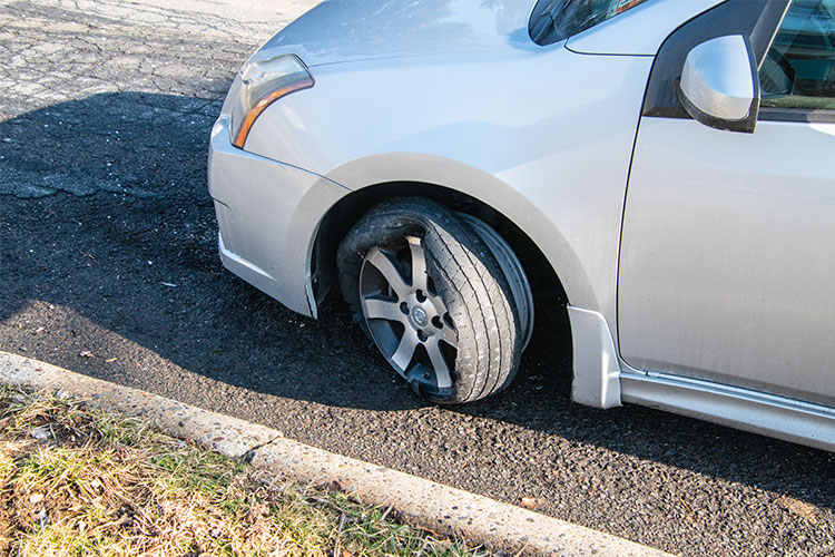 Car with tire blowout - Dallas defective tire attorneys