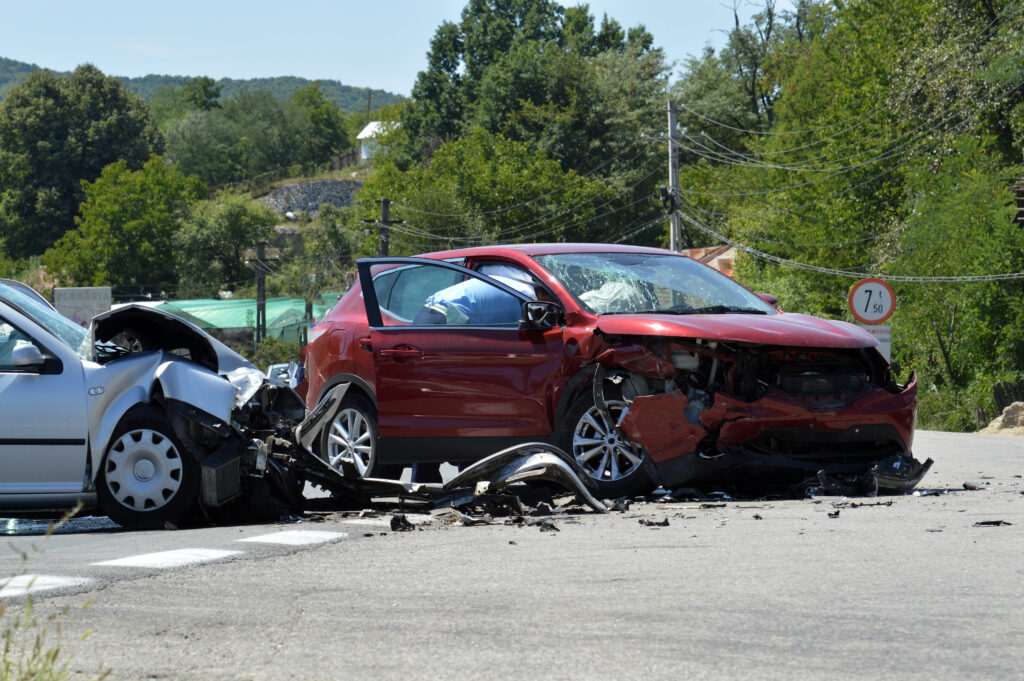Crash where two cars are involved - Cut through a parking lot to avoid a red light leads to a motor vehicle crash.