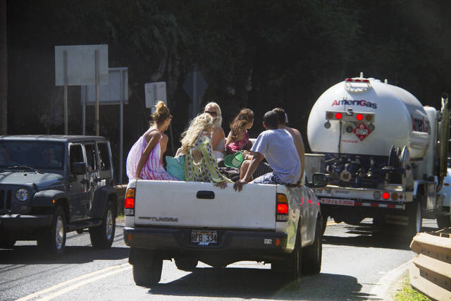 People riding in the bed of a pickup truck while driving-the law by state riding in the bed of a pickup truck
